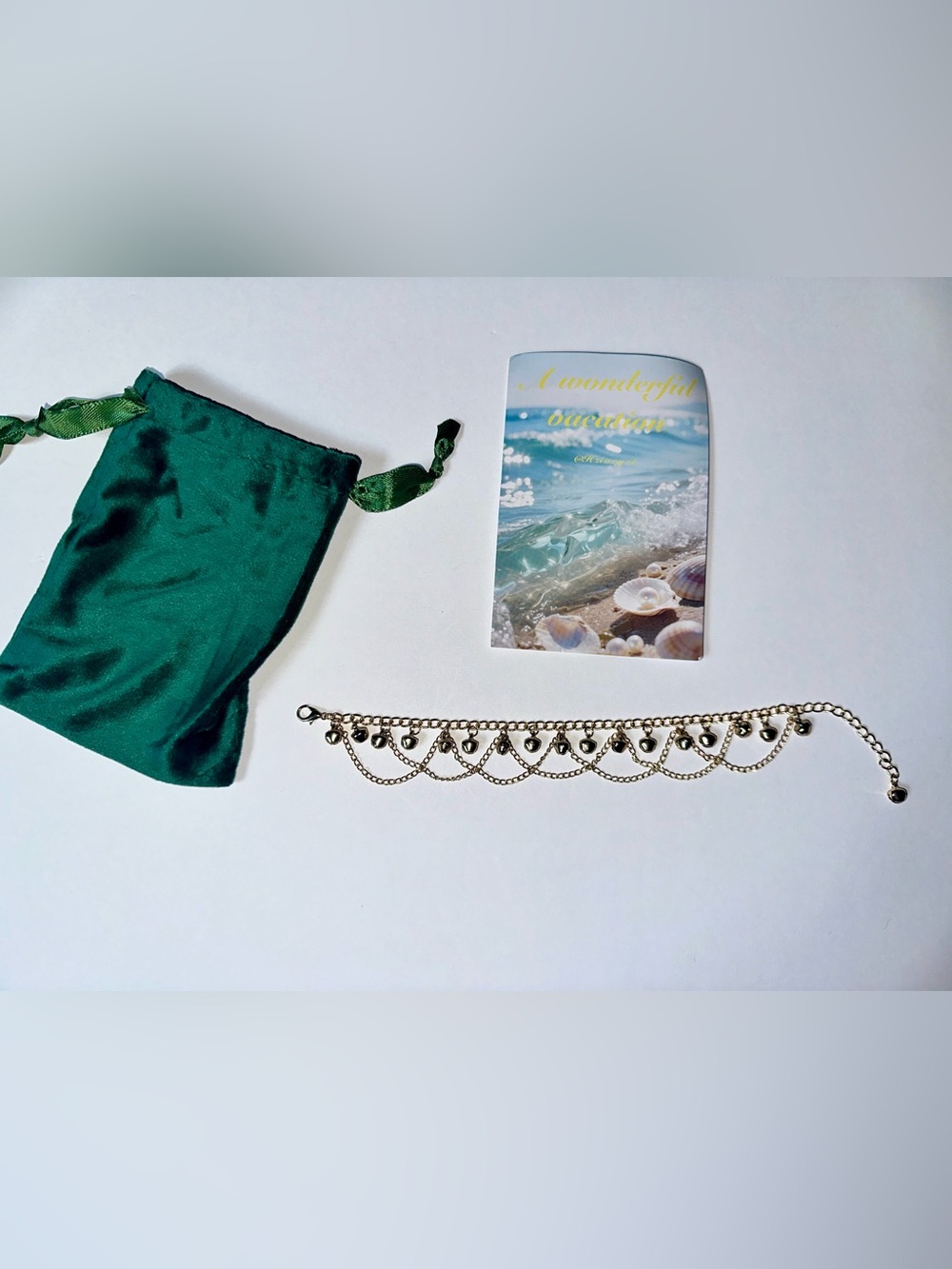 Fashion Jewelry silver-tone scalloped charm bracelet with green pouch